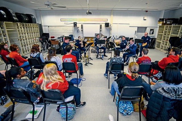 Kaiserslautern High School students listen to a performance by U.S. Air Forces in Europe Band’s Five Star Brass Quintet Nov. 5 on Vogelweh. KHS students had the chance to listen to USAFE Band musicians perform as well as receive feedback during a rehearsal for their upcoming concert.