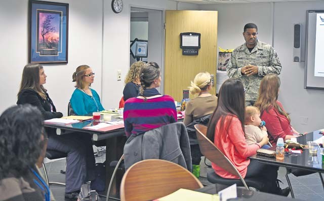 Chief Master Sgt. Phillip L. Easton, 86th Airlift Wing command chief, talks to spouses graduating from the Air Force HeartLink program Oct. 23 at the Ramstein Airman & Family Readiness Center. The goal of HeartLink is to strengthen Air Force families through knowledge about military programs, agencies and the mission.