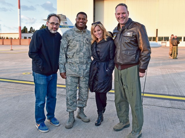 Photo by Staff Sgt. Leslie Keopka Writer and director David Wain and actress Elizabeth Banks stop for a photo with Brig. Gen. Jon T. Thomas, 86th Airlift Wing commander, and Chief Master Sgt. Phillip Easton, 86th AW command chief, during the 2015 USO Holiday Troop Tour Dec. 9 on Ramstein. Thomas welcomed the group of entertainers as well as the Chairman of the Joint Chiefs of Staff during the performance opening.