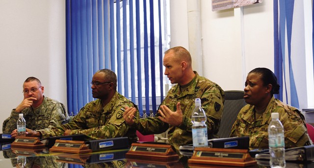 Command Sgt. Maj. Rodney Rhoades, 21st Theater Sustainment Command senior enlisted leader and president of the board (middle right), questions a candidate as fellow board members Master Sgt. Duane Held, 7th Mission Support Command (far left); Sgt. Maj. Daniel Hilton, TSC career counselor (middle left); and Sgt. Maj. Crecencia Jeter, TSC’s 1st Human Resources Sustainment Center, observe during the Retention NCO and Career Counselor of the Year competition board held in November at Panzer Kaserne. Board members asked an array of questions pertaining to general military topics, career-specific knowledge and leadership during the competition. The winners of the competition will represent TSC at a U.S. Army Europe competition scheduled for Dec. 14 to 16 in Wiesbaden, Germany.