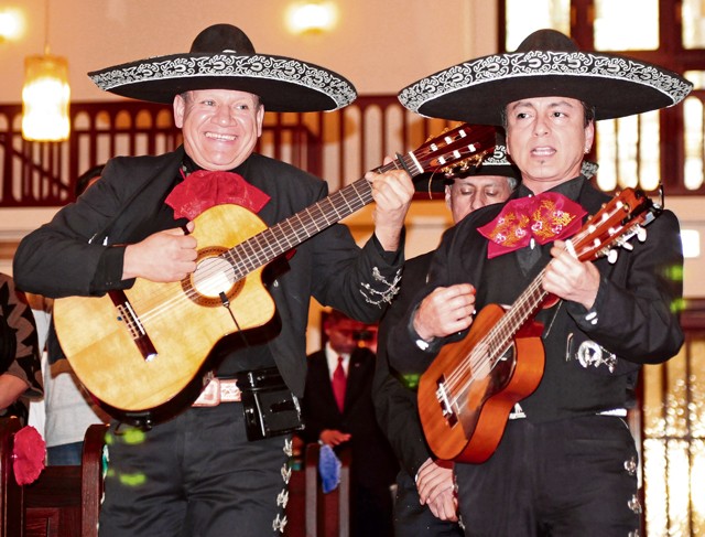 An authentic mariachi band performs the concluding song of a Catholic mass conducted as part of a fiesta held in honor of Our Lady of Guadalupe Dec. 12 on Daenner Kaserne.
