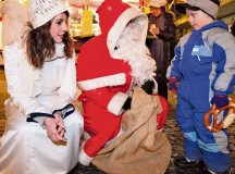 Photo courtesy of the City of Kaiserslautern
Santa Claus and one of his angels visit children and pass out goodies on Santa Claus Day at the Kaiserslautern Christmas market.