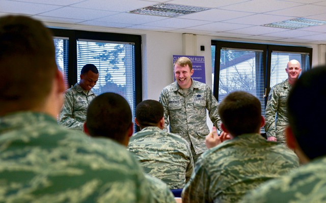 Senior Airman John Burchfield, 86th Force Support Squadron First Term Airman’s Center lead, shares a laugh while heading a class activity to learn about each other Dec. 14 on Ramstein. According to Burchfield, the goal of being an FTAC lead is to serve as an early role model for new Airmen.