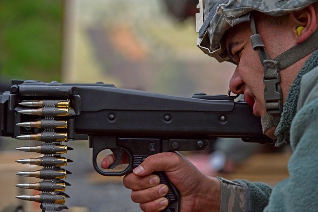 Senior Airman Anthony Bruner, 86th Security Forces Squadron member, aims an MG3 machine gun Nov. 18 in Zweibruecken, Germany. More than 20 members of the 86th SFS attempted to earn the “Bundeswehr,” German army, marksmanship badge by hitting targets with a variety of German weapons. 