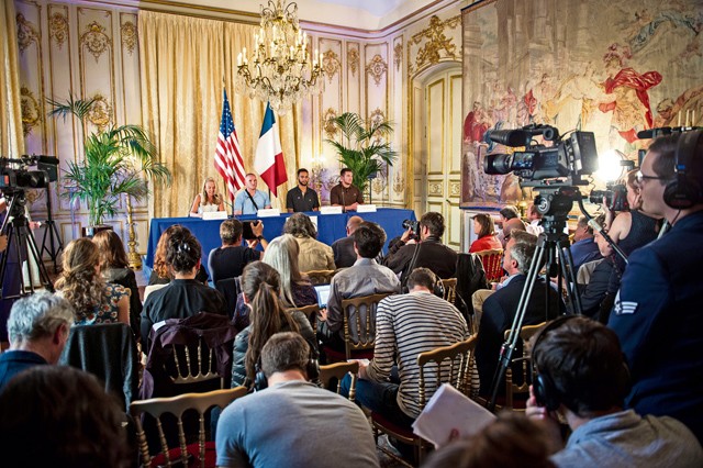 Photo by Tech. Sgt. Ryan Crane U.S. Airman 1st Class Spencer Stone along with Jane D. Hartly, U.S. ambassador to France, and his two friends speak at a press conference Aug. 23, 2015, in Paris following a foiled attack on a French train. Stone was on vacation with his childhood friends Aleksander Skarlatos and Anthony Sadler when an armed gunman entered their train carrying an assault rifle, handgun and box cutter. The three friends, with the help of a British passenger, subdued the gunman after his rifle jammed. Stone’s medical background prepared him to begin treating wounded passengers while waiting for the authorities to arrive. Stone is an ambulance service technician with the 65th Medical Operations Squadron stationed at Lajes Field, Azores, Portugal. 