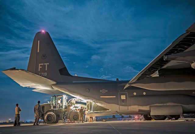 Photo by Airman 1st Class Cory Bush  Airmen from the 435th Contingency Response Squadron unload cargo off an HC-130J Combat King II Sept. 28, 2015, at Diyarbakir Air Base, Turkey. All equipment and manpower was being used in support of a U.S. Air Forces Central Command support personnel recovery mission to strengthen the recovery capabilities in the region.