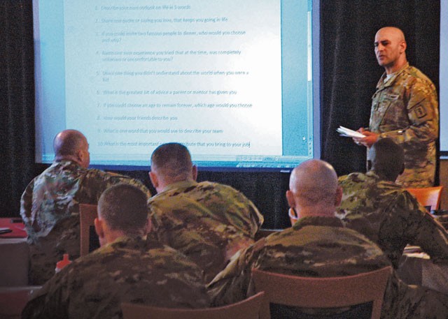 A sergeant major shares a personal insight with fellow leaders during the icebreaker event at the 2016 21st Theater Sustainment Command senior enlisted leaders seminar. Thirty leaders participated in the two-day conference where they discussed ideas and challenges related to leadership in the Army.