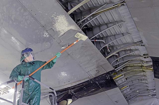 Airman 1st Class Zachary Ohannessian, 86th Maintenance Squadron crew chief, scrubs the wing of a Ramstein C-130J Super Hercules Jan. 4 on Ramstein. The wash is preparation work for the aircraft’s C-2 isochronal inspection.