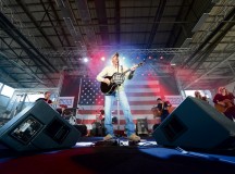 Photo by Airman 1st Class Tryphena Mayhugh
Country music singer Trace Adkins performs for members of the KMC during a USO concert 
April 20, 2015, on Ramstein. Adkins has participated in 10 USO tours and has performed for troops in seven countries.