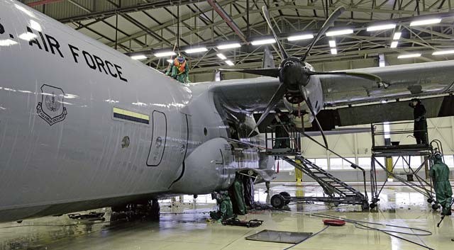 86th Maintenance Squadron Airmen wash a Ramstein C-130J Super Hercules before a C-2 isochronal inspection Jan. 4 on Ramstein. This examination marks the 14th and final C-2 ISO inspection for the 86th Airlift Wing until 2020.