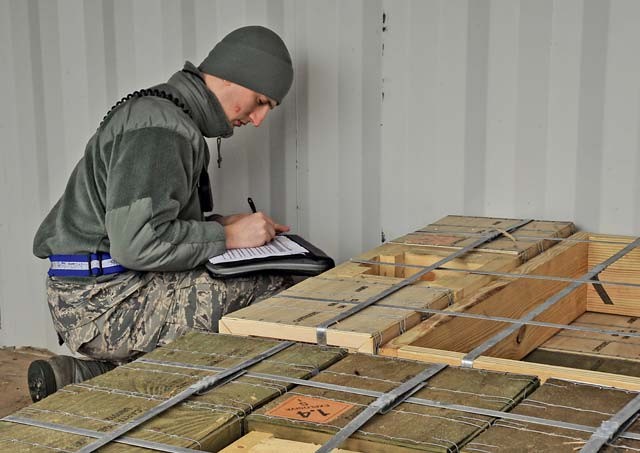 Senior Airman Nathan Slagle, 86th Munitions Squadron munitions storage crew chief, takes accountability of explosives and checks for vulnerabilities on an artillery delivery Dec. 8 on Ramstein. The 86th MUNS provides “the lethal edge” to combatant commands around the world.