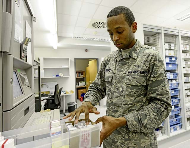Staff Sgt. Joshua Moore, 86th Medical Support Squadron pharmacy technician, performs his daily task of counting the narcotics in the controlled substance vault Dec. 15 at the Ramstein pharmacy. When a patient needs a controlled substance, the pills are counted twice by the technician and once by the pharmacist on duty.