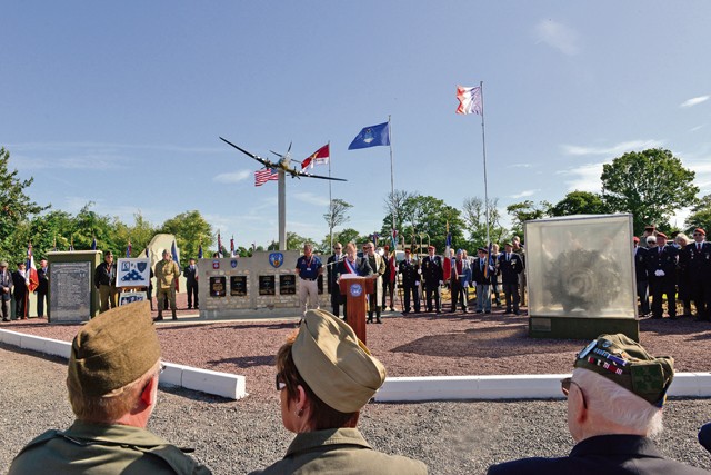 Photo by Senior Airman Nicole Sikorski Lt. Gen. Darryl Roberson, 3rd Air Force and 17th Expeditionary Air Force commander, speaks during a memorial ceremony at the Picauville 9th Air Force monument June 4, 2015, in Normandy, France. More than 380 service members from Europe and affiliated D-Day historical units participated in the 71st anniversary as part of Joint Task Force D-Day 71. The task force, based in Saint Mere Eglise, France, supported local events across Normandy from June 2 to 8, 2015, to commemorate the selfless actions by all the Allies on D-Day that continue to resonate 71 years later.