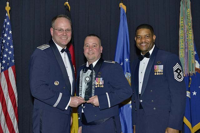 Innovator of the Year — Fuel Systems Repair Section, 86th Maintenance Squadron. Accepting is Maj. Kevin Kobithen, 86th MXS commander.