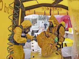Members of the 773rd Civil Support Team wash and decontaminate the victim of a simulated chemical spill during exercise Ocean Response Feb. 11 on Rhine Ordnance Barracks. The 773rd trained along with members of the Spanish “Unidad Militar de Emergencias,” which translates to “Military Emergencies Unit,” and the Slovenian army during the exercise.