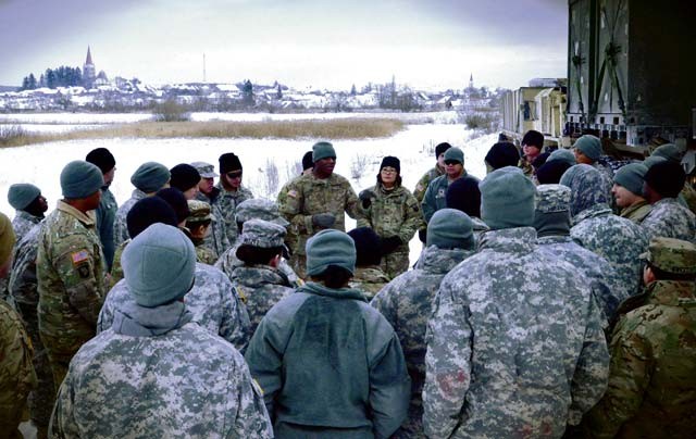 Photo by Sgt. Daniel Wyatt Soldiers assigned to the 240th Quartermaster Support Company, 18th Combat Sustainment Support Battalion receive a safety brief from the convoy commander, 2nd Lt. Doniel Lee, before departure to Mihail Kogalniceanu Jan. 23 during “Supply Shock.” Supply Shock is part of a series of company-level readiness exercises empowering junior leaders to demonstrate sustainment capabilities provided by the 16th Sustainment Brigade.