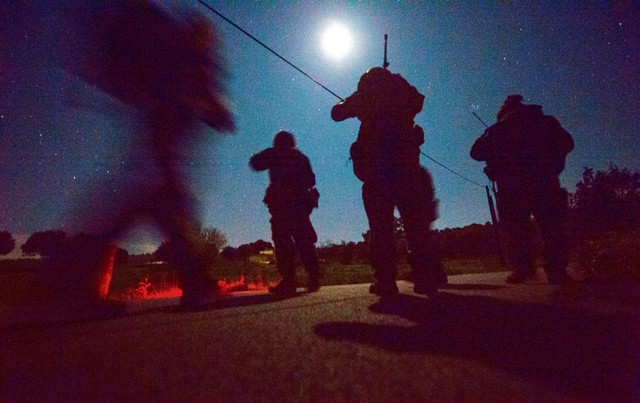 Joint terminal attack controllers from the 2nd Air Support Operations Squadron work through a nighttime scenario as part of exercise Serpentex 16 March 15 in Corsica, France. Training at night helps JTACs hone their skills by using different tools and techniques to call in close air support under more challenging circumstances.