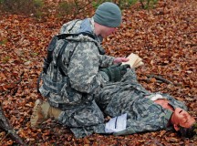 A competitor administers first aid to a simulated casualty during the 266th Financial Management Center’s Best Warrior Competition March 2 on Rhine Ordnance Barracks.