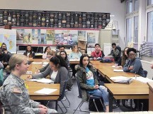 Capt. Jennifer Bromm, trial counsel, and Capt. Matt Montazzoli, administrative law attorney, both of the 21st Theater Sustainment Command, provide legal information to junior and senior students in Mark Fairchild’s Street Law class March 25 at Kaiserslautern High School on Vogelweh. These students are preparing for the upcoming mock trial to be held as part of the 21st TSC Law Day celebration on May 2.