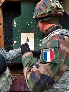 Photo by 2nd Lt. Nicholas MolinelliFrench cadet Oliver Galeron of the French Combined Arms Academy inspects his target Feb. 4 after a day at the small arms range on Baumholder.