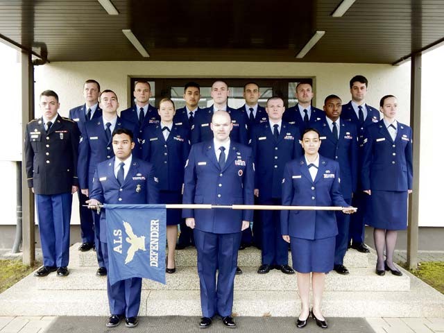 Courtesy photo Defender flight poses in front of the Airman Leadership School building March 15 on Vogelweh. On the far left, Spc. Dean Iversen, 92nd Military Police Battalion gunner, is the first Soldier to attend ALS in U.S. Air Forces in Europe’s history.
