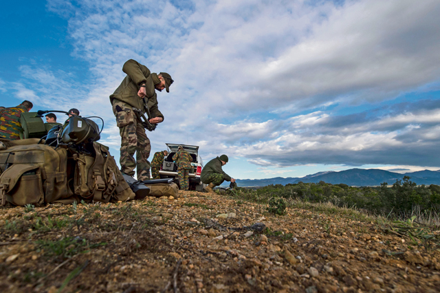 Canadian and French joint terminal attack controllers prepare their equipment for the first day of training during exercise Serpentex 16 March 7 in Corsica, France. Training and theater security cooperation engagements with U.S. allies and partners, such as exercise Serpentex, demonstrate a shared commitment to promoting security and stability.