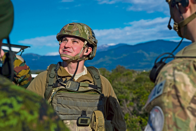 Tech. Sgt. Jeremy Rarang, 2nd Air Support Operations Squadron joint terminal attack controller, interacts with fellow JTACs from the Royal Canadian Horse Artillery during exercise Serpentex 16 March 7 in Corsica, France.