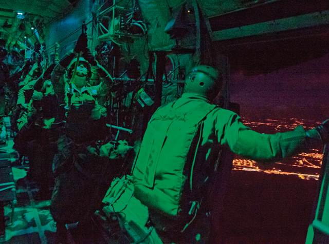 Portuguese paratroopers jump out of a Ramstein C-130J Super Hercules assigned to the 37th Airlift Squadron as part of exercise Real Thaw 16 Feb. 22 in Beja, Portugal. The 37th AS Airmen supported approximately 70 paratroopers during the event.