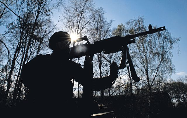 An instructor from the 435th Security Forces Squadron removes a weapon from a Humvee April 11 on Ramstein. The Airmen practiced for scenarios they might encounter during deployment.