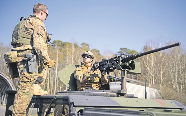 A 435th Contingency Response Group member listens to a 435th Security Forces Squadron instructor April 11 on Ramstein. Both Airmen trained for a deployment to ensure the security and efficiency of their teams.