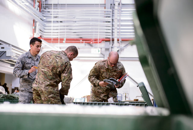 Airmen from the 435th Air Ground Operations Wing receive equipment for their upcoming deployment April 11 on Ramstein. During the week, the Airmen gathered necessary equipment and documents for a future deployment. Airmen from the 435th AGOW must be ready to deploy and perform their mission at a moment’s notice.