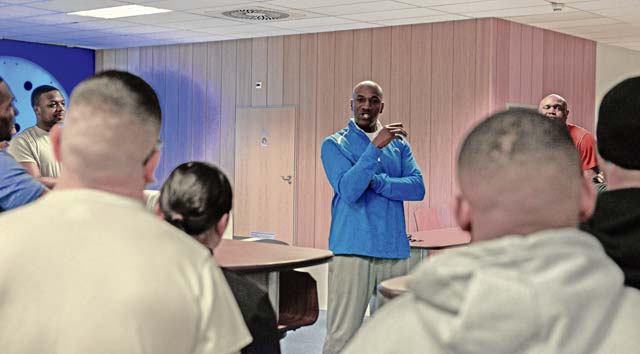 Chief Master Sgt. Kaleth Wright, 3rd Air Force command chief, talks to Airmen at “The Huddle” March 30 on Ramstein. The Huddle is a hangout for Airmen to meet leaders around Ramstein, who mentor and help them grow professionally in a relaxed environment.