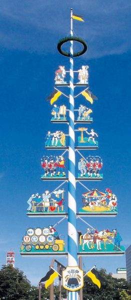 Courtesy photo Many villages put up May trees the night of April 30 or morning of May 1. The pole is decorated with colorful ribbons, and craftsmen’s trade ornaments like sausages for the butchers, pretzels for the bakers or carved wooden figures.