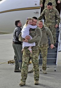 Airmen reunite with their families after returning from a deployment March 15 on Ramstein. The 76th Airlift Squadron Airmen aided an important mission by providing executive airlift and aeromedical evacuation.