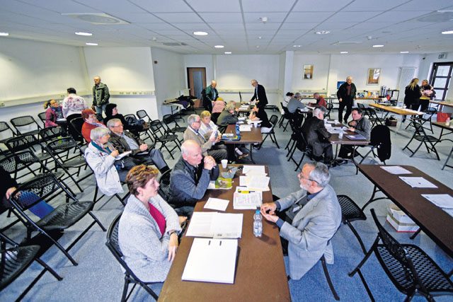 Couples speak to casualty assistance agencies during a Surviving Spouses Workshop April 16 on Ramstein. To alleviate some of the stress of losing a loved one, the Kaiserslautern Military Community Retiree Counsel hosted the first workshop to educate retired military members and their spouses about the correct paperwork needed to receive entitlements and benefits.