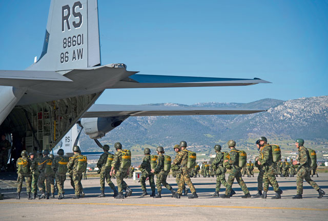 Photo by Staff Sgt. Nancy KasbergGreek paratroopers board a U.S. Air Force C-130J Super Hercules during Stolen Cerberus III April 12 in Elefsis, Greece. Throughout the two-week combined-forces training, Greek armed forces and personnel from 37th Airlift Squadron at Ramstein shared best practices. 