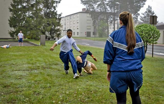 Senior Airman Clifford Hughley, 86th Aeromedical Evacuation Squadron technician, drags a dummy during a nurses and technicians scavenger hunt May 11 on Ramstein. Airmen spent time each day for a week participating in camaraderie-building activities.