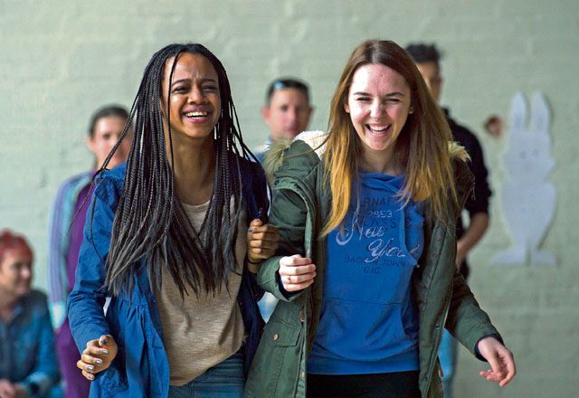 Nair (left) and Francesca participate in a three-legged race during a community engagement event led by Airmen from Ramstein April 23 in Landstuhl.