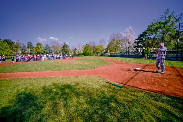 Photos by Senior Airman Nicole Keim Brig. Gen. Jon T. Thomas, 86th Airlift Wing commander, gives opening comments during an Adaptive Sports softball game May 2 on Ramstein. Students from Kaiserslautern and Ramstein middle and high schools paired up with volunteers from the local Guzzlers softball team to participate in the event.