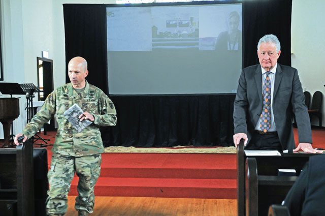 Col. Matthew D. Redding, 21st Theater Sustainment Command chief of staff, and Thomas C. Nunn, TSC deputy chief of staff, address participant questions during a community town hall conducted for command civilian personnel April 28 on Daenner Kaserne. The leaders discussed topics ranging from the command vision, mission readiness and the importance of the civilian workforce to human and fiscal resource management, the “five-year rule,” individual development plans, integration of new civilian personnel and the importance of training the workforce. They delivered preliminary remarks and, afterward, fielded participant questions. 