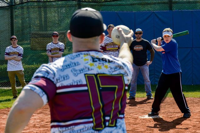 Tech. Sgt. Clifford Howey, 86th Security Forces Squadron assistant flight chief, pitches a ball during an Adaptive Sports softball game May 2 on Ramstein. More than 20 Ramstein and Kaiserslautern middle and high school students participated in the event.