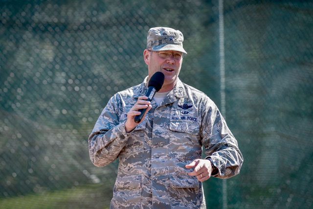 Brig. Gen. Jon T. Thomas, 86th Airlift Wing commander, gives opening comments during an Adaptive Sports softball game May 2 on Ramstein.