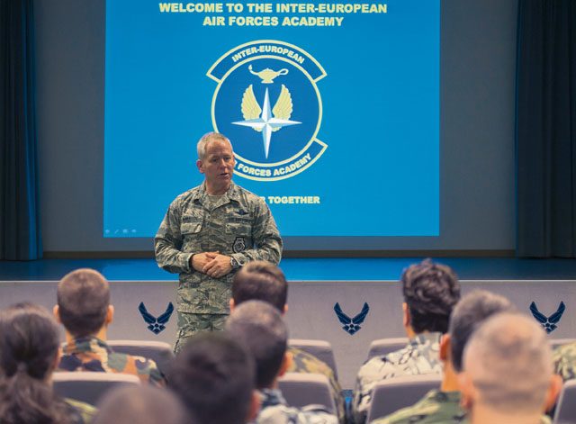 Maj. Gen. John K. McMullen, U.S. Air Forces in Europe and Air Forces Africa operations, strategic deterrence and nuclear integration director, speaks with NATO partners during the kickoff of the Inter-European Air Forces Academy inaugural in-residence Squadron Officer School and NCO Academy class April 25 on Ramstein. The class will last five weeks and is comprised of 31 international air force officers and NCOs from 11 countries.