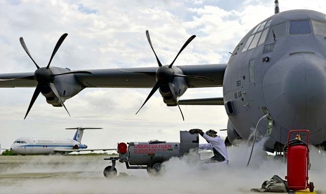 An Airman from the 86th Maintenance Squadron releases liquid oxygen out of a C-130J Super Hercules before flight during exercise Carpathian Spring May 10 on Otopeni Air Base, Romania. The 37th Airlift Squadron and Romania have been participating in these squadron-based deployments since 1996. 