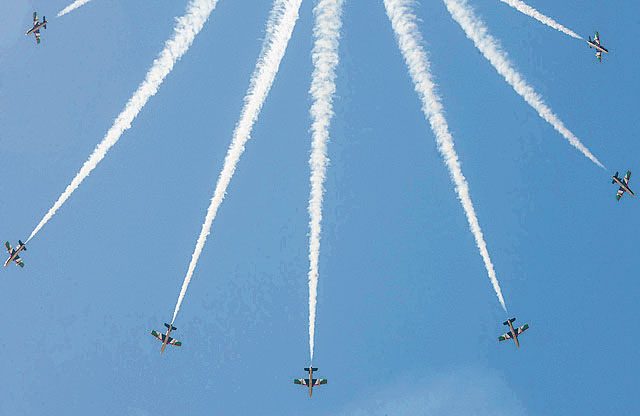 Pilots with the United Arab Emirates’ air force aerobatic display team demonstrate the Al Fursan aircraft's in-flight capabilities during the International Marrakech Air Show April 27 in Morocco. Several U.S. independent and government-owned aircraft were displayed at the expo in an effort to demonstrate their capabilities to a broad audience of individuals from approximately 54 other countries.
