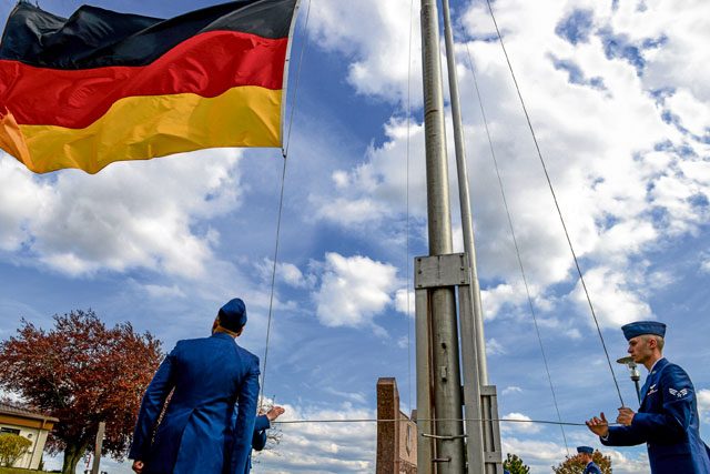 Airmen from the 86th Operations Group lower the German flag during a retreat and remembrance ceremony April 29 on Ramstein.