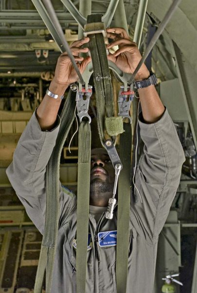 Senior Airman Brandon Ravenell, 37th Airlift Squadron loadmaster, prepares a C-130J Super Hercules during exercise Carpathian Spring May 9 on Otopeni Air Base, Romania. Carpathian Spring 2016 provides U.S. Airmen the opportunity to train in a different environment and alongside allied forces in Romania.