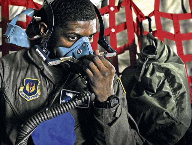 Senior Airman Johnathan Jeffery, 86th Aeromedical Evacuation Squadron technician, dons an oxygen mask during an exercise May 11 on Ramstein. The 86th AES Airmen constantly train for real-world, medical-evacuation missions to ensure patients have the best care possible.