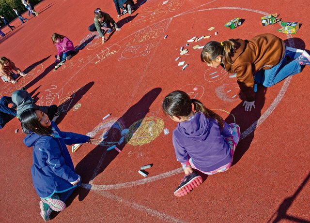 Children from Vogelweh Elementary School draw out their emotions during a therapy session April 21 on Vogelweh. During the Turkey evacuation, dozens of families separated from service members in Turkey, and some are now in the KMC.