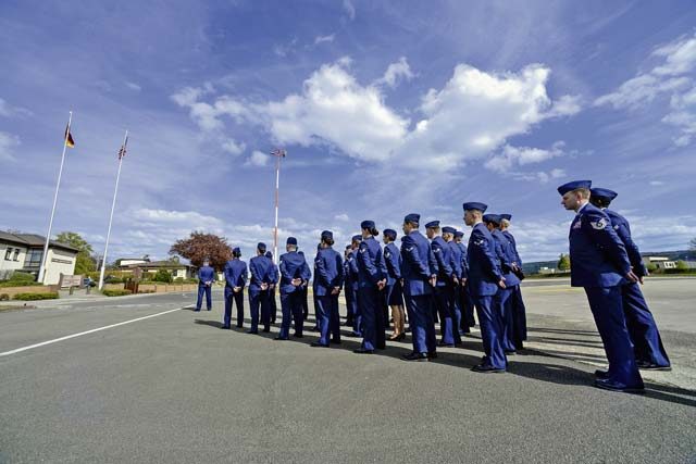 Airmen from the 86th Operations Group stand in a formation before a retreat and remembrance ceremony April 29 on Ramstein.